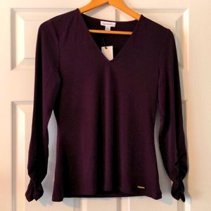 Calvin Klein burgundy top, size Small